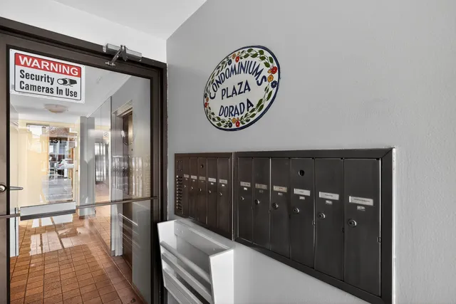 a view of a hallway with elevator