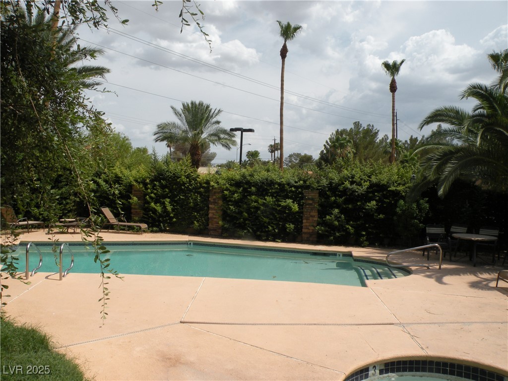 3135 South Mojave Road, Unit 260 Las Vegas, NV 89121 - Photo 20 of 23 Swimming pool with a patio area