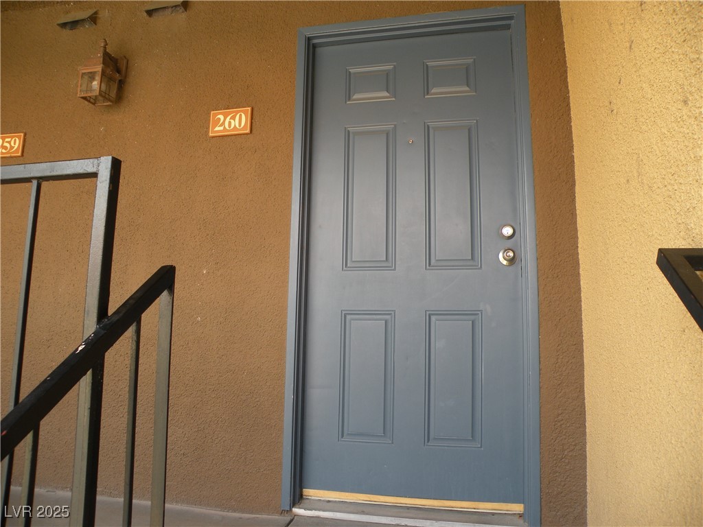 3135 South Mojave Road, Unit 260 Las Vegas, NV 89121 - Photo 3 of 23 Property entrance with stucco siding