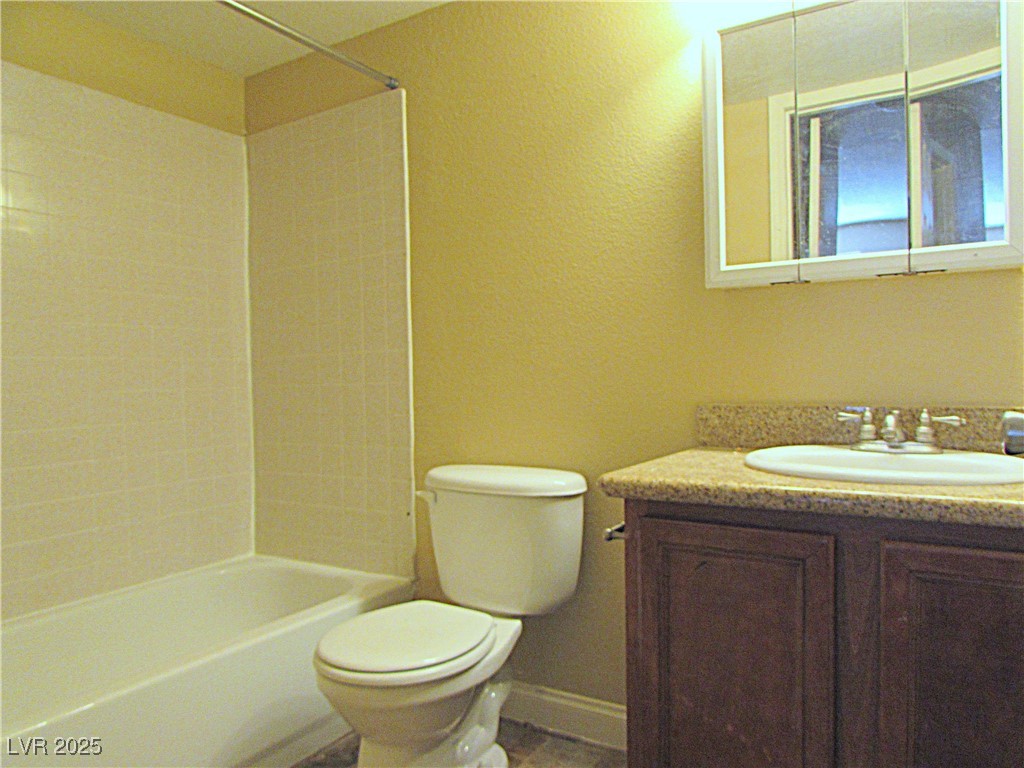 3135 South Mojave Road, Unit 260 Las Vegas, NV 89121 - Photo 10 of 23 Bathroom featuring vanity and bathtub / shower combination