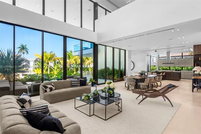 a living room with furniture or couch and a view of kitchen
