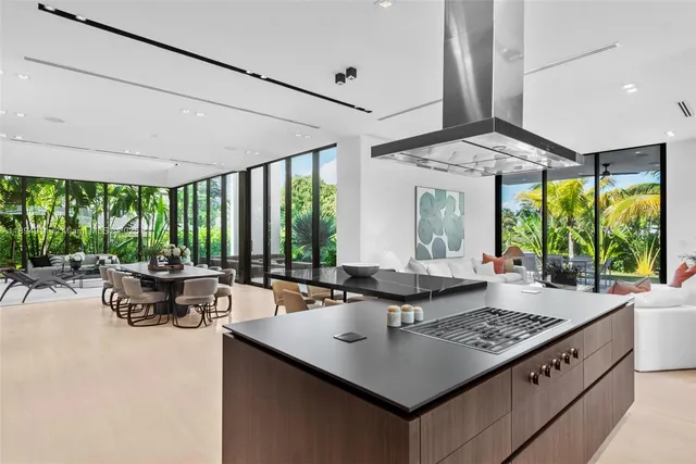 a bathroom with a bathtub shower sink and mirror