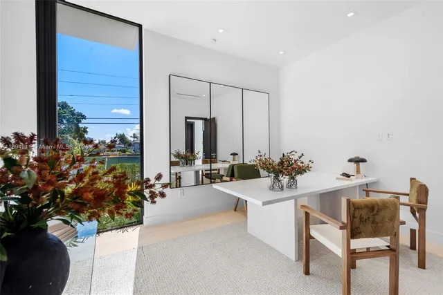 a view of swimming pool with outdoor seating