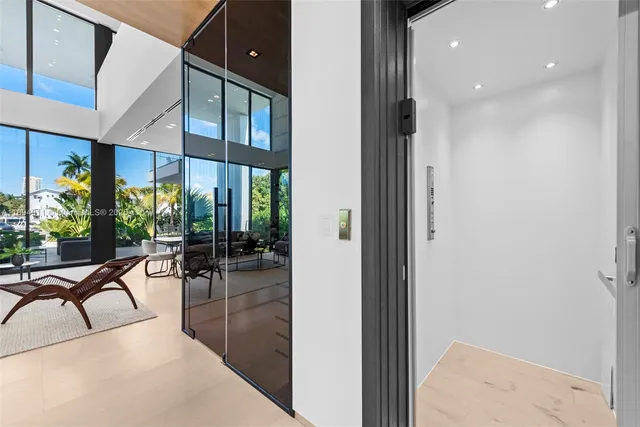 a view of swimming pool with outdoor seating