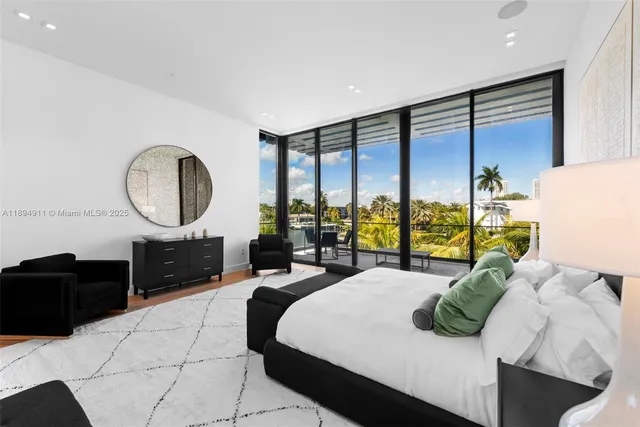 a swimming pool view with a garden space