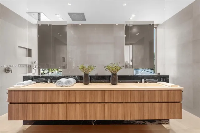 a view of a swimming pool with a table and chairs