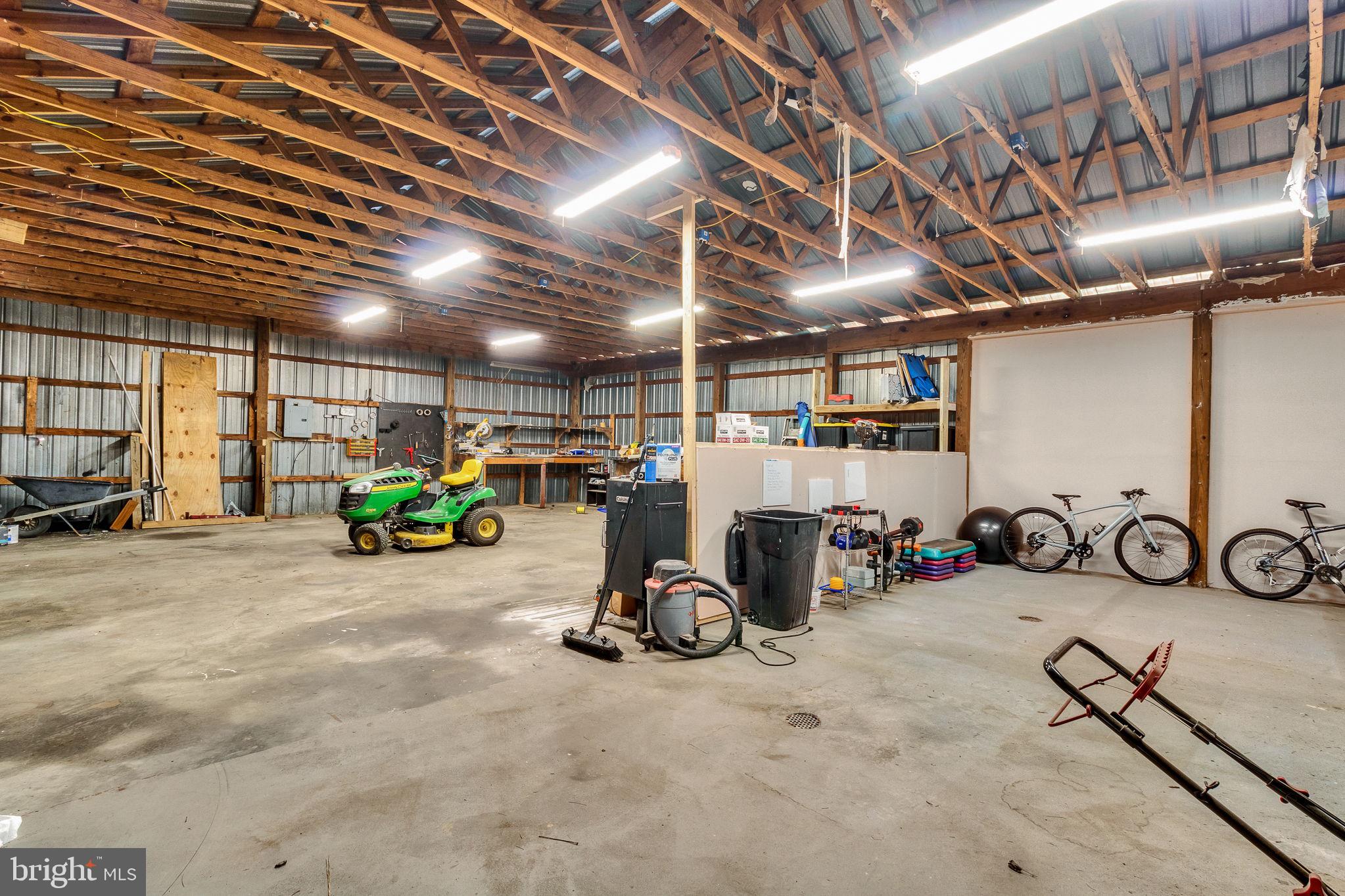 9832 River Road Lancaster, VA 22503 - Photo 34 of 68 Spacious garage with rustic charm.
