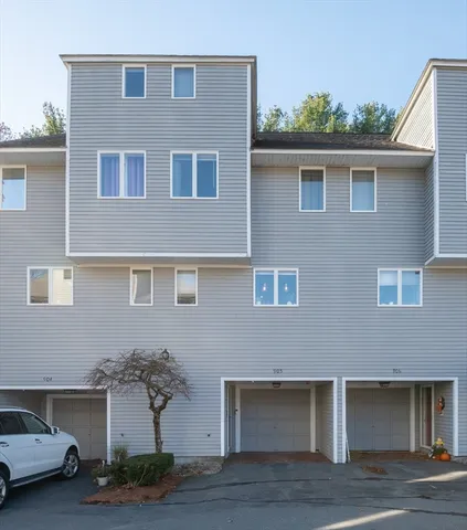 a front view of a house with yard