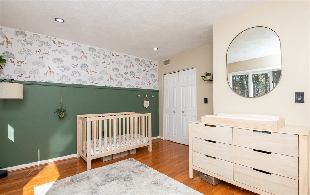 905 Sherwood Forest Lane, Unit 905 Saugus, MA 01906 - Photo 21 of 42 a view of a livingroom with wooden floor and a window