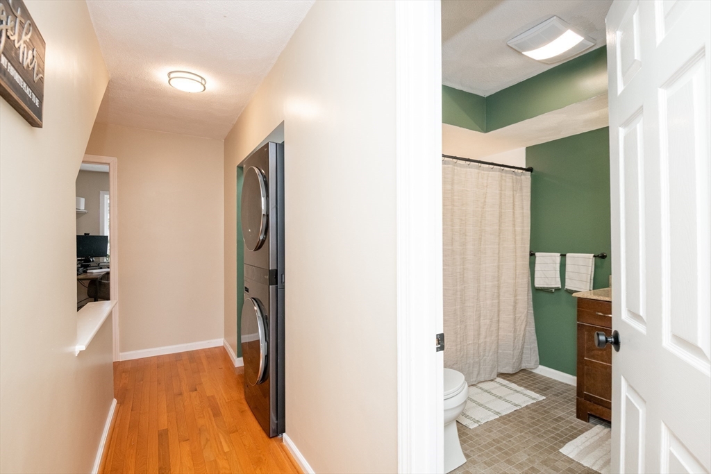 905 Sherwood Forest Lane, Unit 905 Saugus, MA 01906 - Photo 27 of 42 a view of hallway with wooden floor