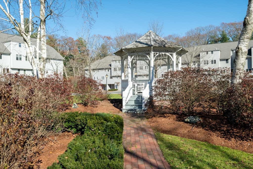 905 Sherwood Forest Lane, Unit 905 Saugus, MA 01906 - Photo 38 of 42 a view of a house with a yard