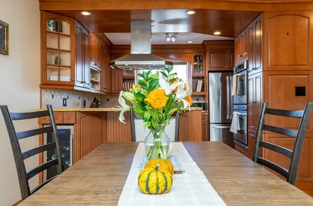 a vase of flowers sitting on a table