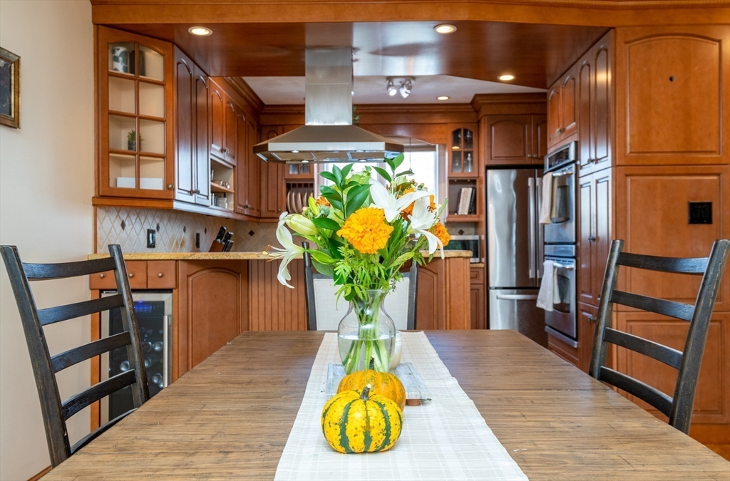 905 Sherwood Forest Lane, Unit 905 Saugus, MA 01906 - Photo 6 of 42 a vase of flowers sitting on a table