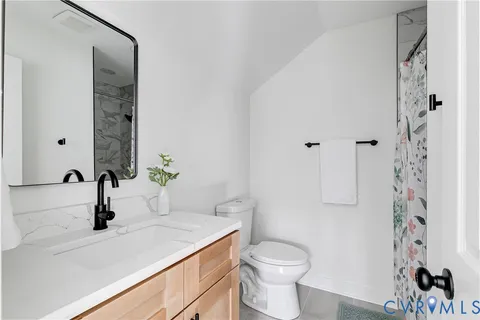 a bathroom with a sink and a toilet