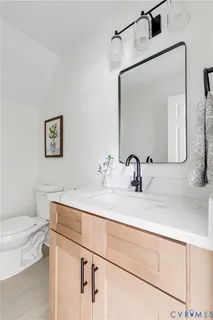 a bathroom with a sink and a toilet