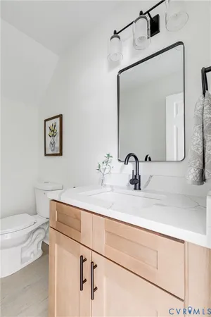 a bathroom with a sink and a toilet