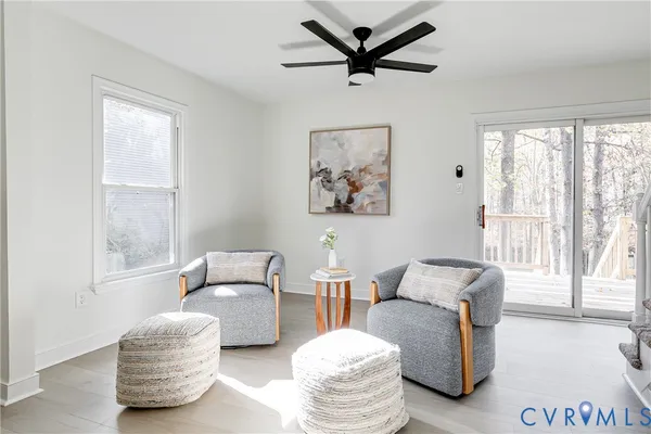 a living room with furniture and a window