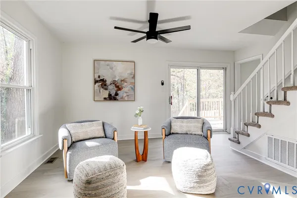 a living room with furniture and a window
