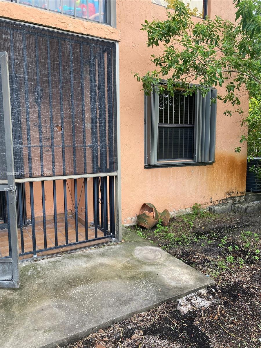 2460 West 67th Place, Unit 10127 Hialeah, FL 33016 - Photo 31 of 36 Accordion Shutters throughout the unit