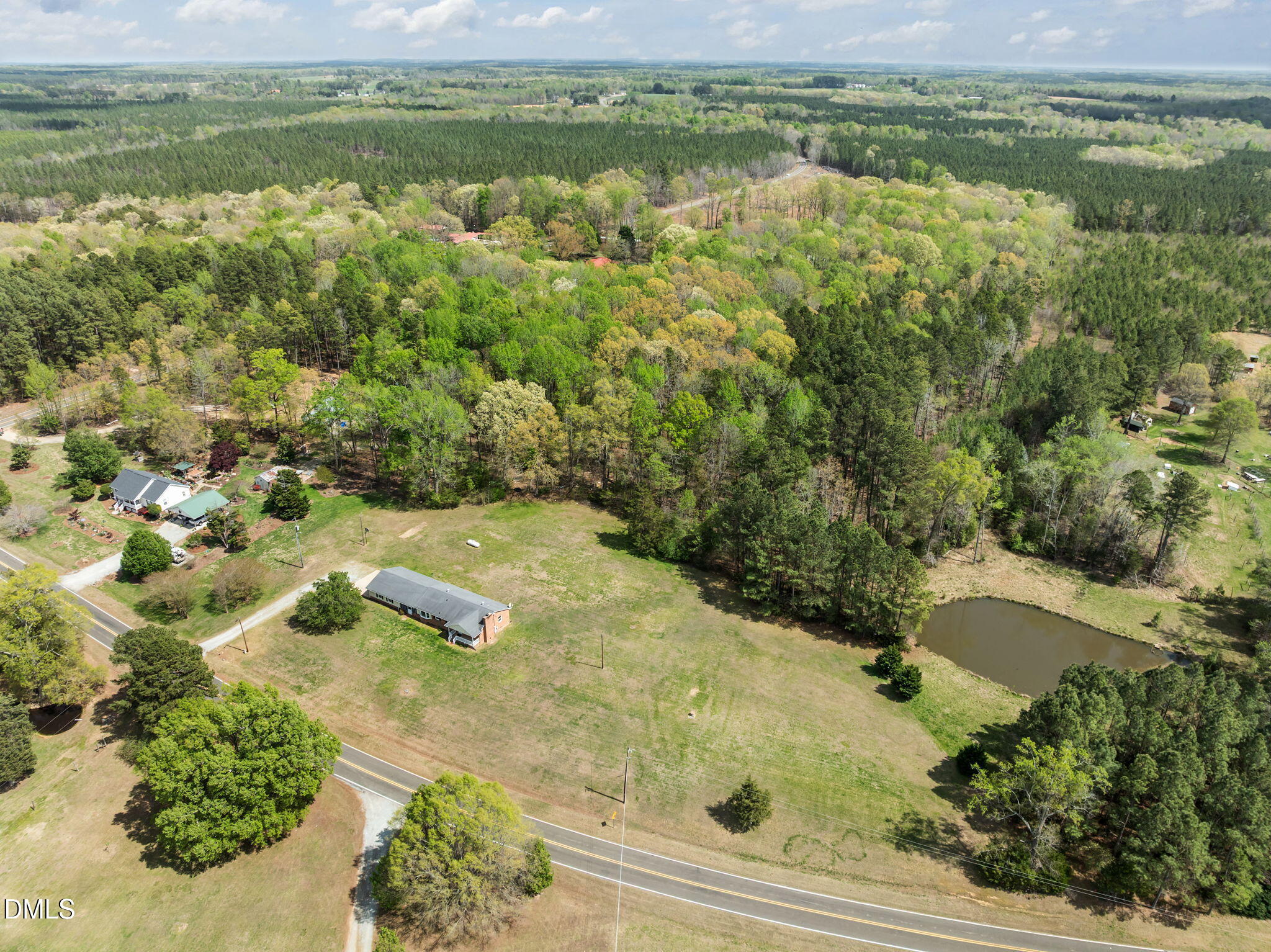95 Harold Gill Road Roxboro, NC 27574 - Photo 30 of 53 a view of a swimming pool with a yard