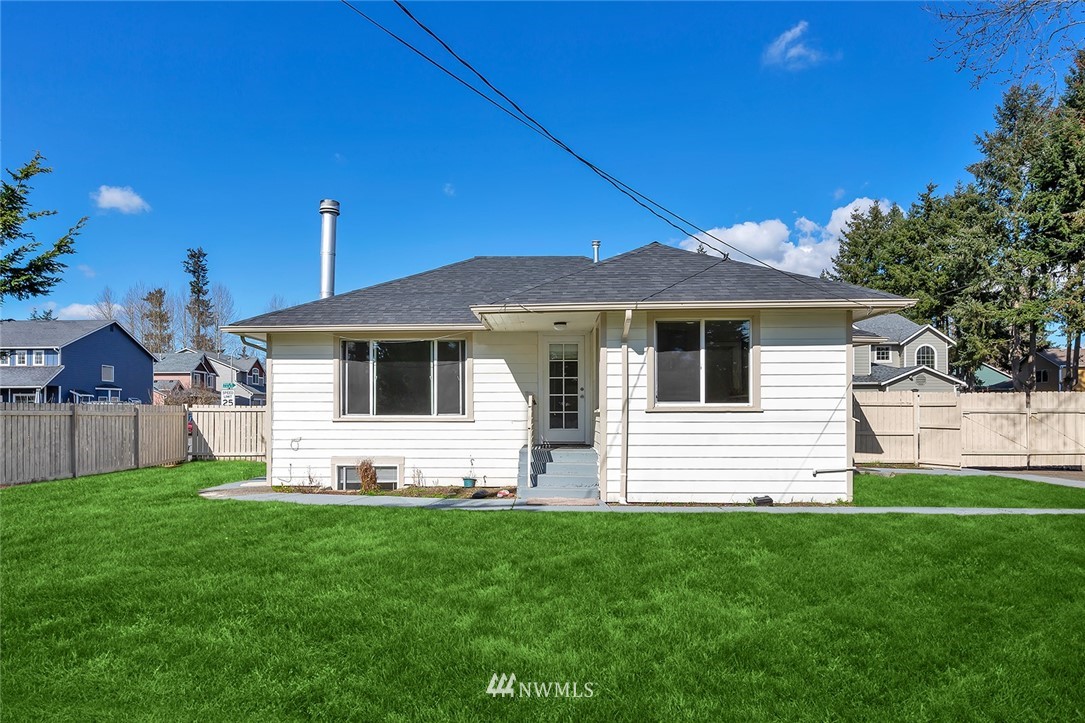 a front view of house with yard
