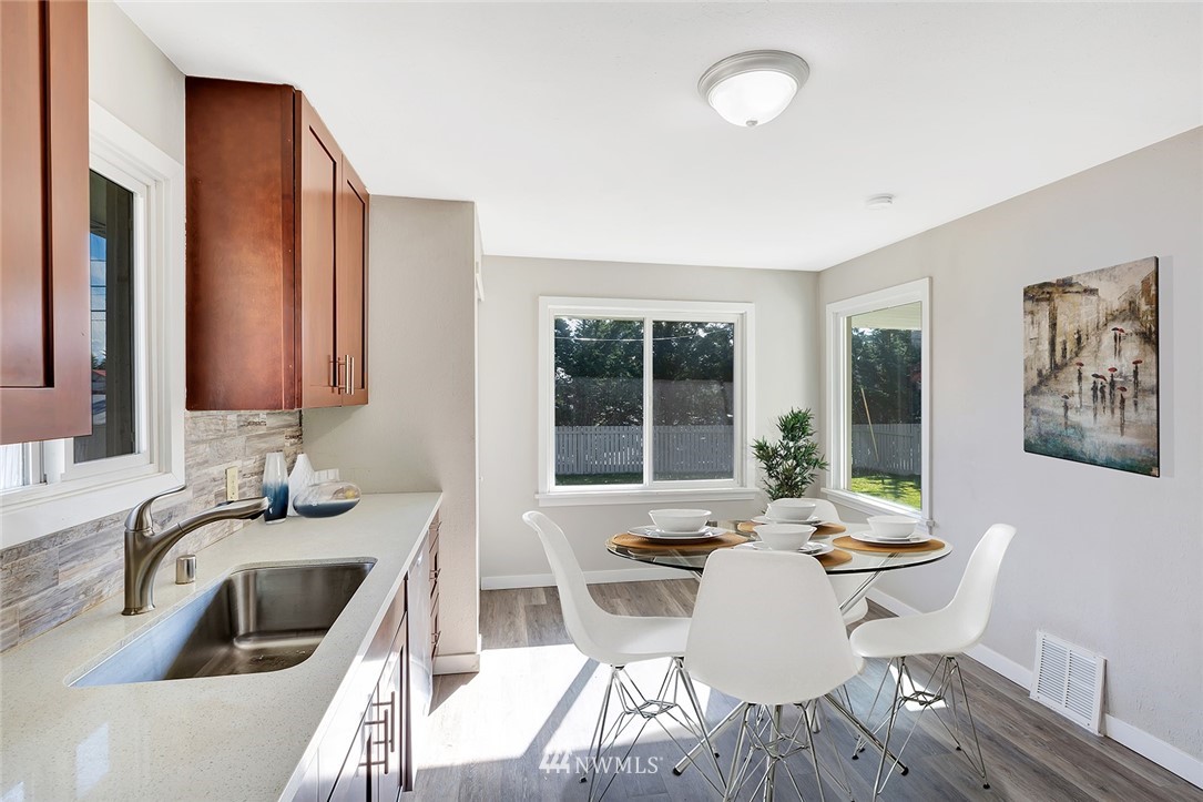 5300 Northeast 4th Street Renton, WA 98059 - Photo 3 of 12 a dining room with furniture and window