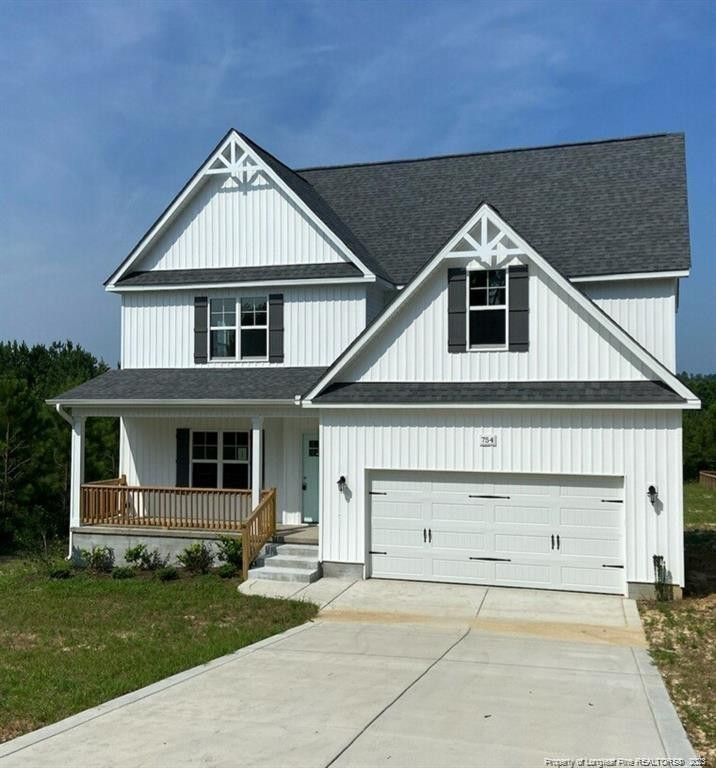 754 Walker (lot 1) Road Rockingham, NC 28379 - Photo 1 of 50 a front view of a house with a yard