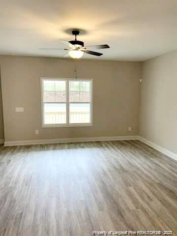 754 Walker (lot 1) Road Rockingham, NC 28379 - Photo 12 of 50 wooden floor in an empty room with a window