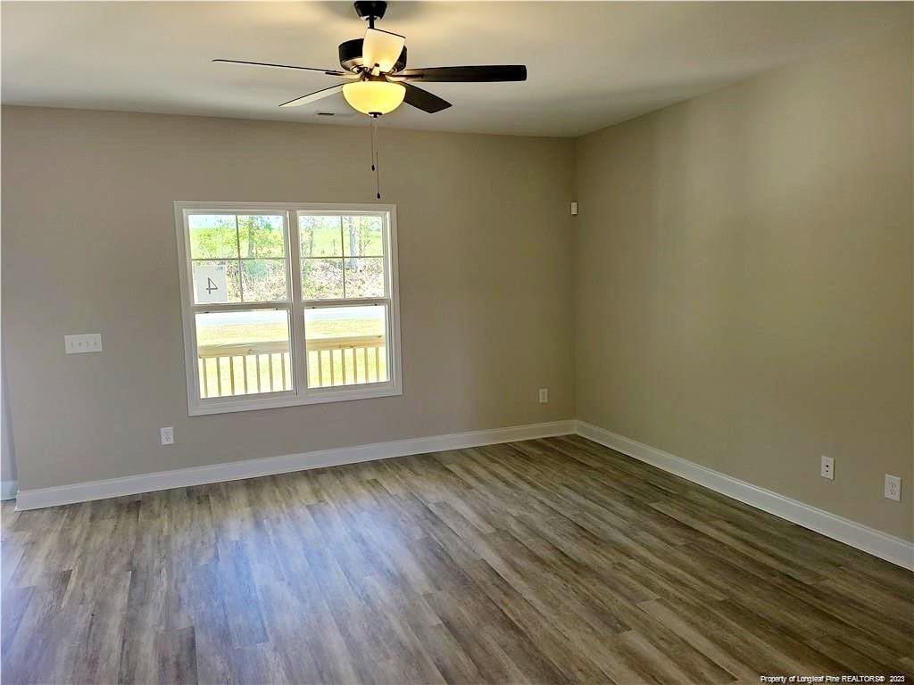 754 Walker (lot 1) Road Rockingham, NC 28379 - Photo 14 of 50 wooden floor in an empty room with a window