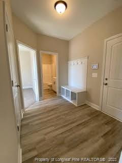 754 Walker (lot 1) Road Rockingham, NC 28379 - Photo 27 of 50 a view of an empty room with wooden floor and a window
