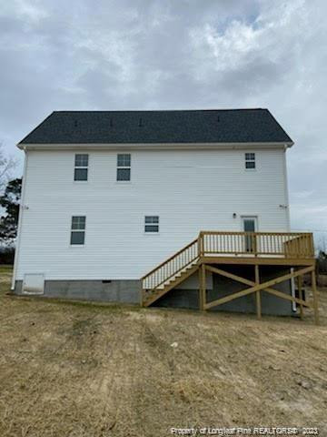 754 Walker (lot 1) Road Rockingham, NC 28379 - Photo 38 of 50 a view of a house with a yard and sitting area