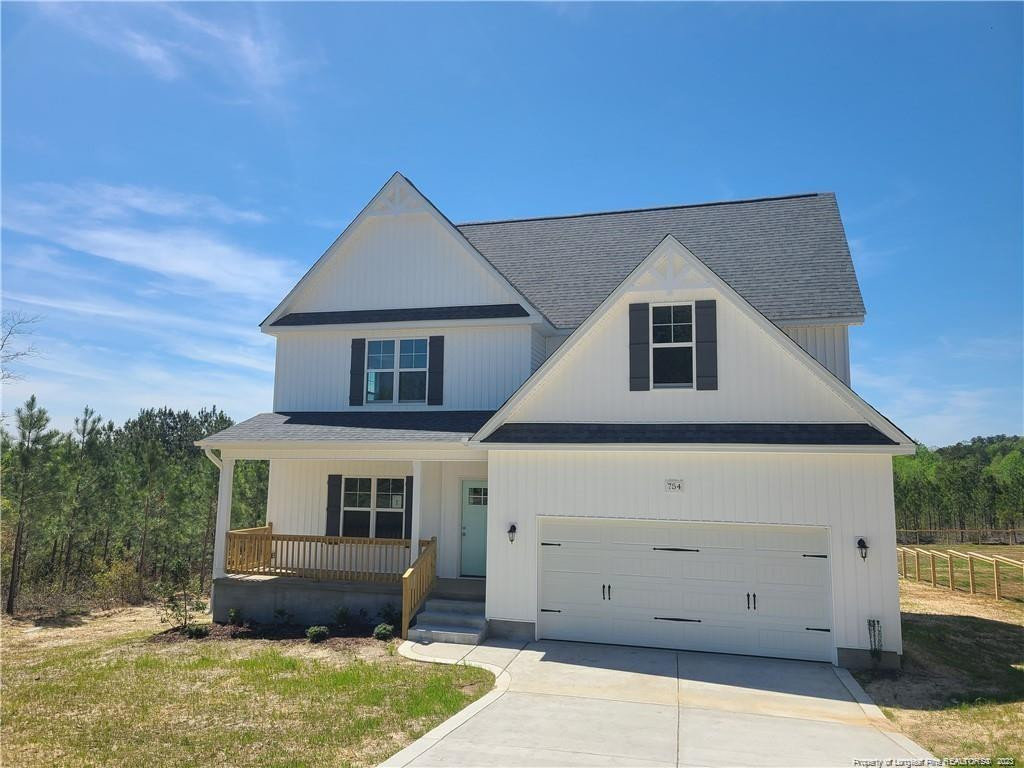 754 Walker (lot 1) Road Rockingham, NC 28379 - Photo 4 of 50 a house view with a garden space