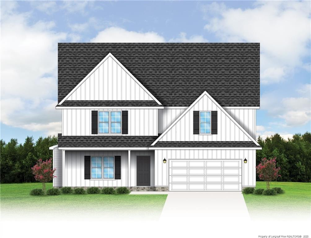 754 Walker (lot 1) Road Rockingham, NC 28379 - Photo 42 of 50 a front view of a house with a yard