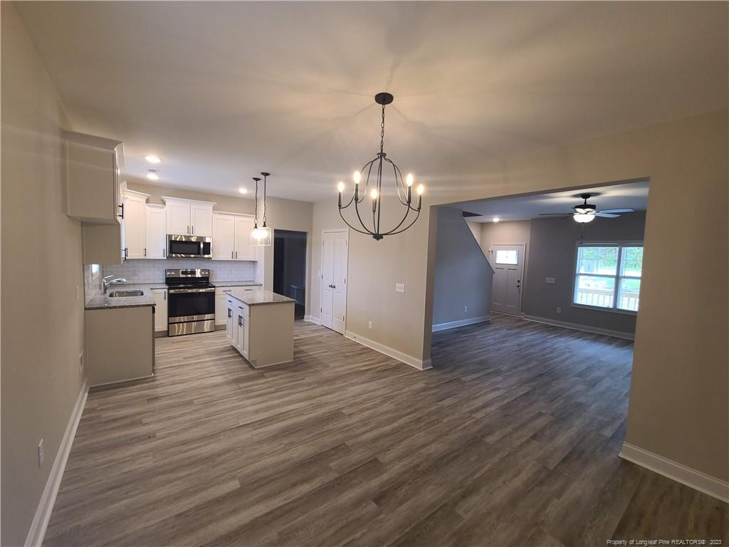 754 Walker (lot 1) Road Rockingham, NC 28379 - Photo 50 of 50 a view of a kitchen with a sink wooden floor and kitchen view