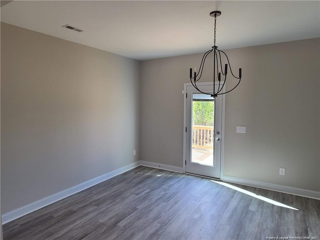 754 Walker (lot 1) Road Rockingham, NC 28379 - Photo 5 of 50 a view of empty room with window and chandelier