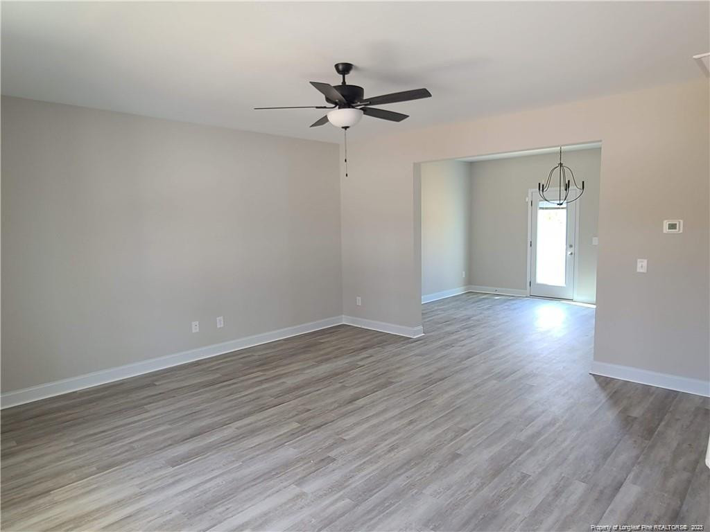 754 Walker (lot 1) Road Rockingham, NC 28379 - Photo 6 of 50 wooden floor in an empty room with a window