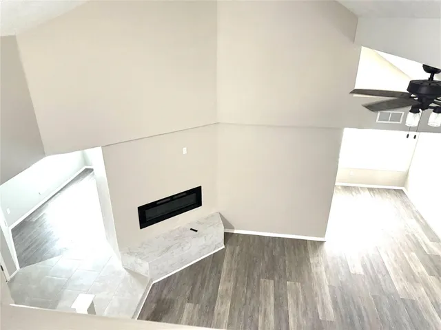 a living room with a couch and a flat screen tv