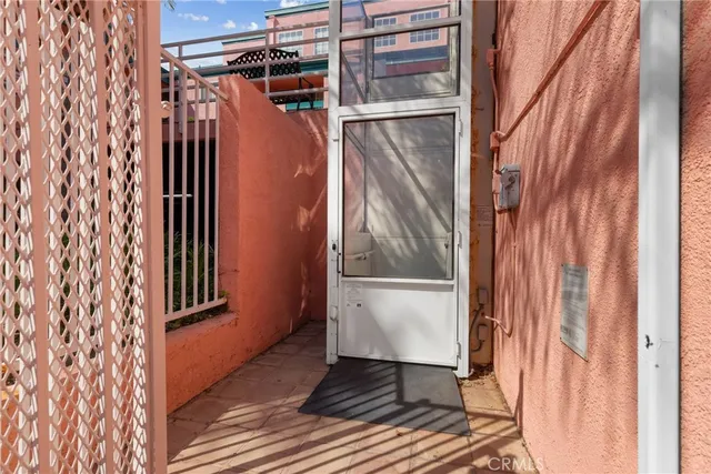 a view of the house with potted plants