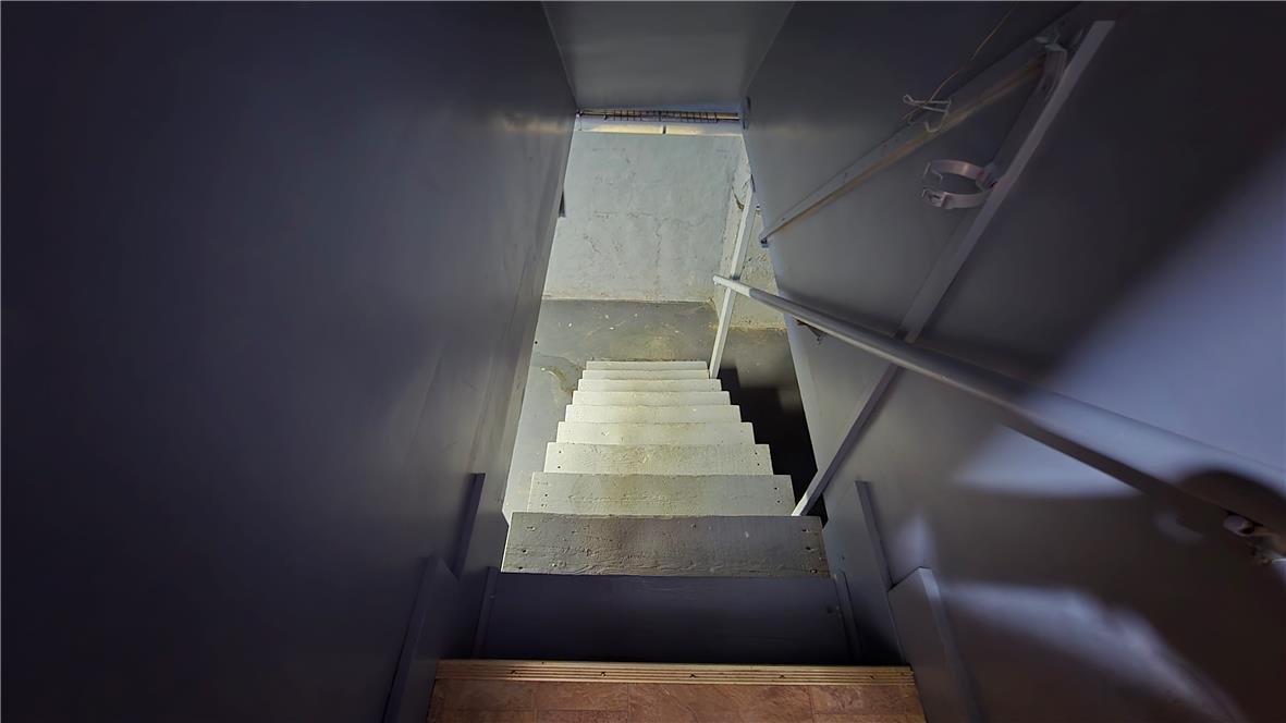 883 North Locust Street Hazleton, PA 18201 - Photo 73 of 83 Functional basement stairs provide essential access to additional living or storage space.