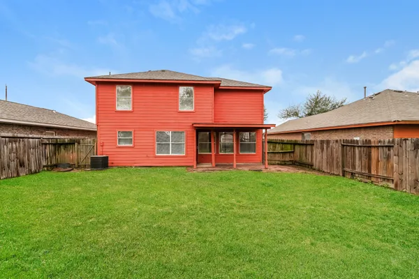 a front view of a house with yard