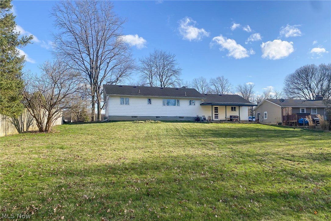 39974 Butternut Ridge Road Elyria, OH 44035 - Photo 37 of 40 Rear view of house with a yard