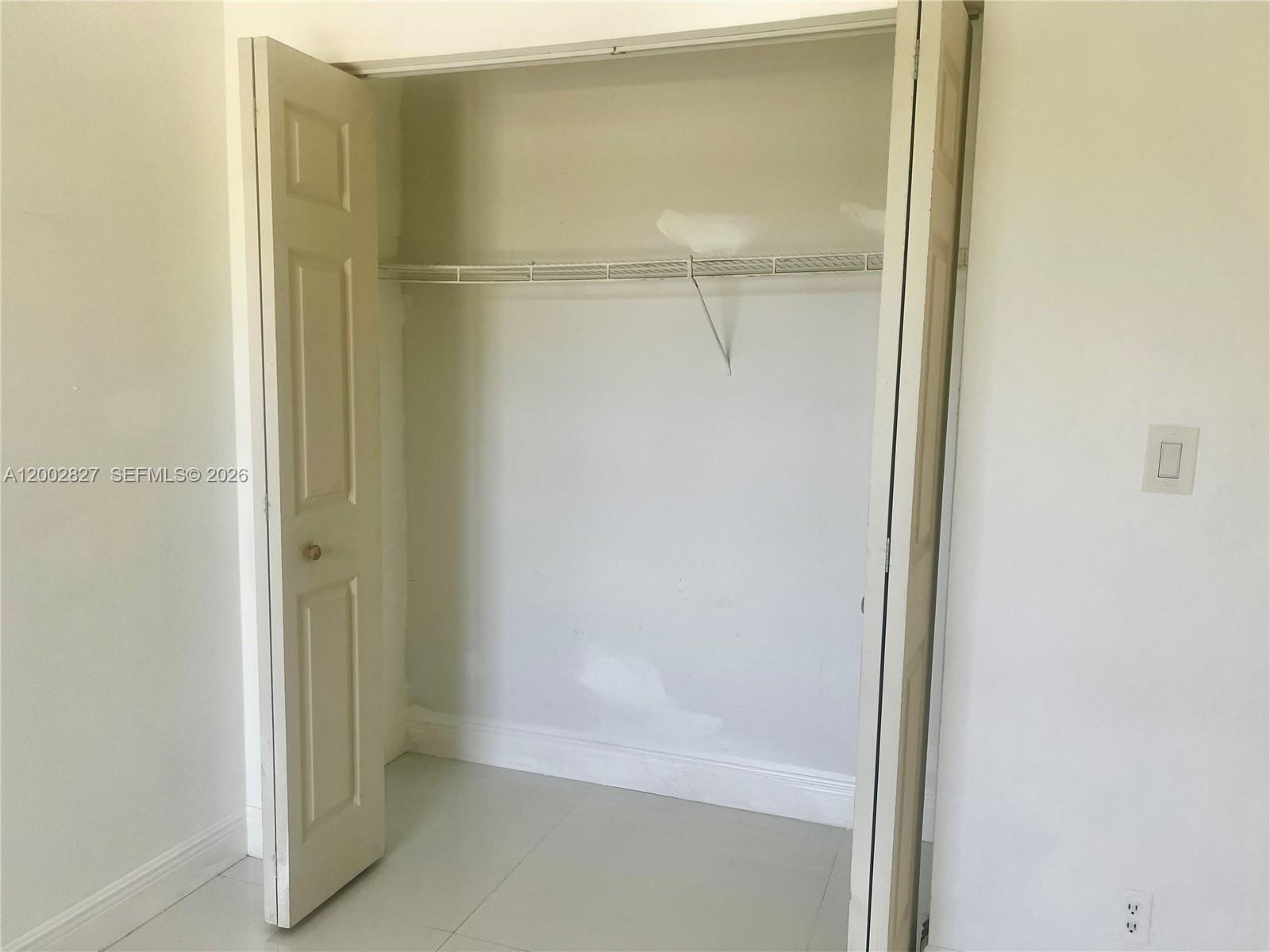 405 South Pine Island Road, Unit 403D Plantation, FL 33324 - Photo 9 of 14 a bathroom with a glass shower door