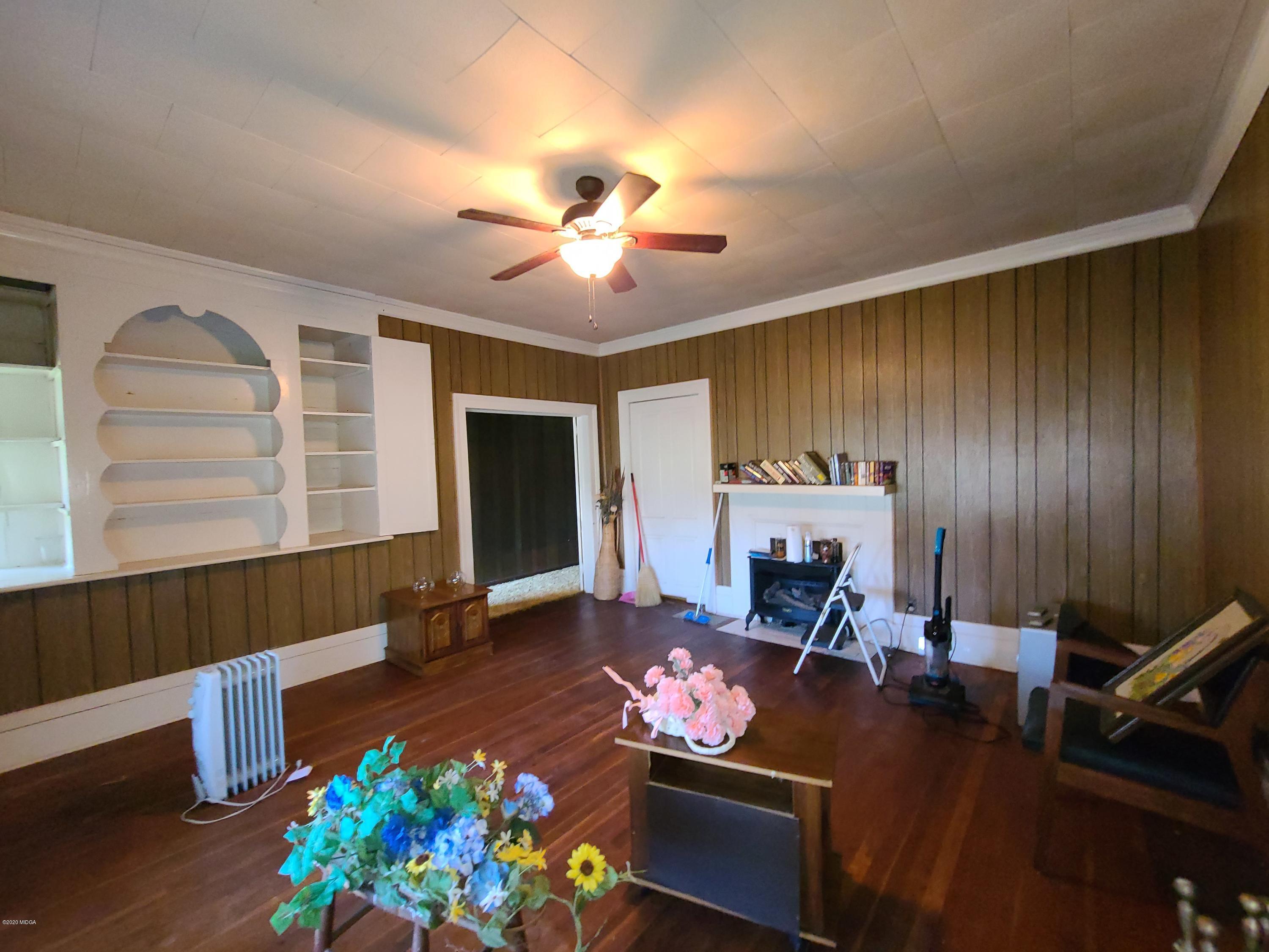 3824 Hartley Bridge Road Macon, GA 31216 - Photo 9 of 26 a living room with furniture