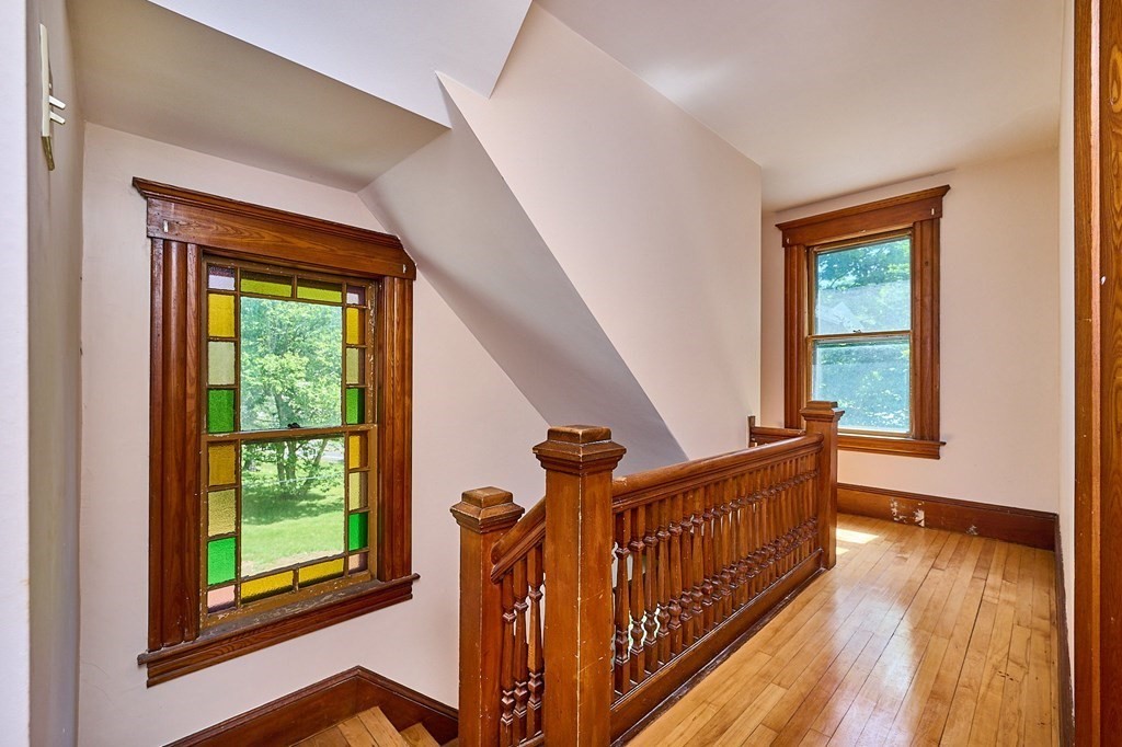 303 Main Road Colrain, MA 01340 - Photo 13 of 30 a view of an entryway with wooden floor and door