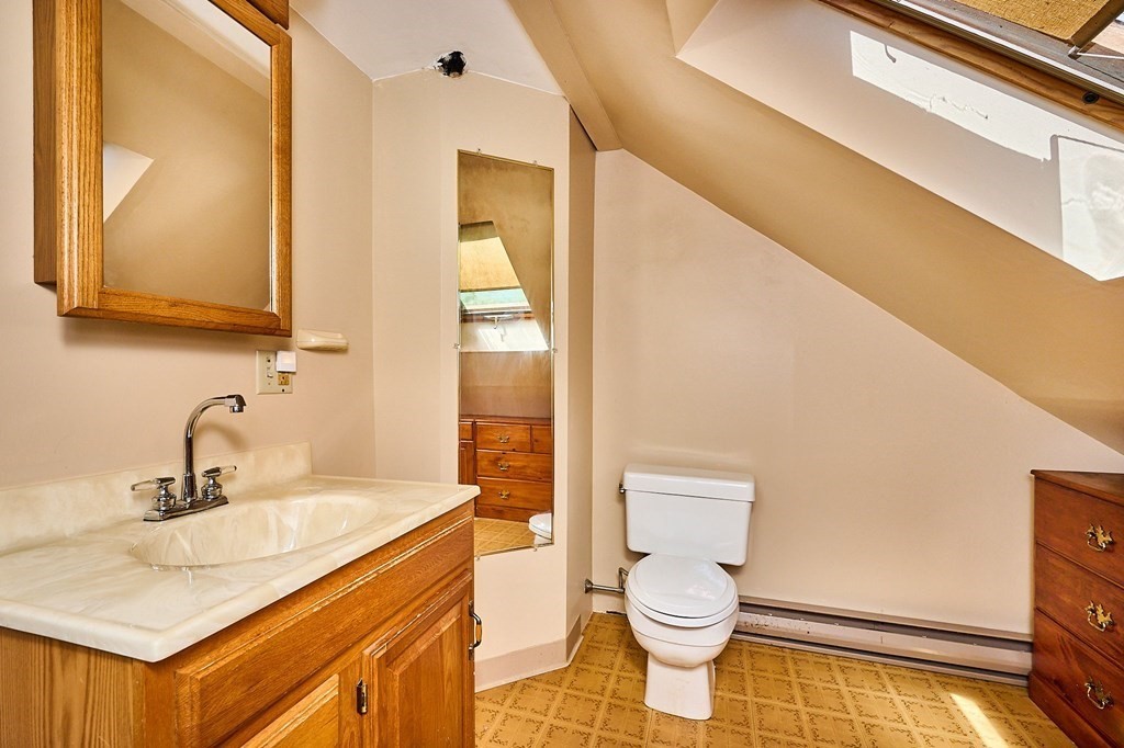 303 Main Road Colrain, MA 01340 - Photo 14 of 30 a bathroom with a sink and a mirror