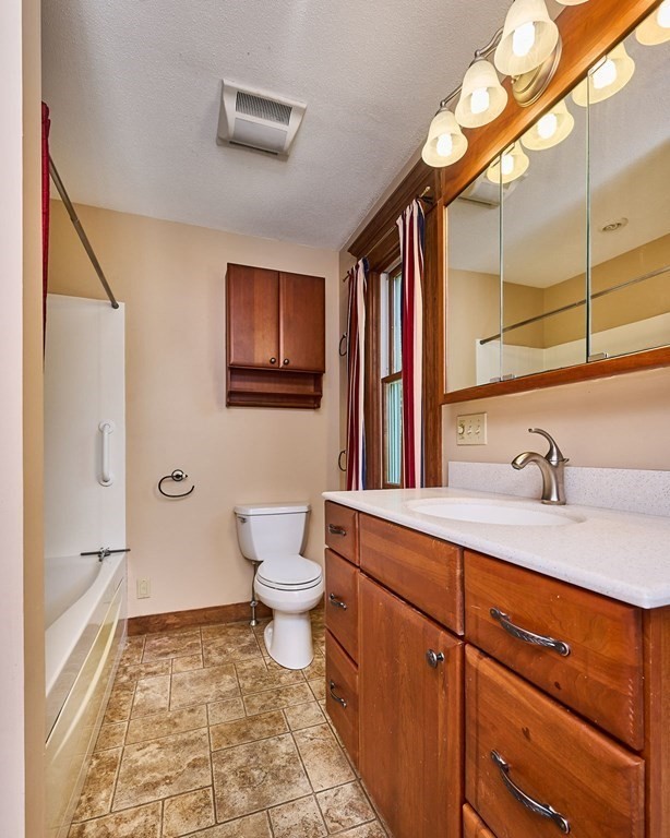 303 Main Road Colrain, MA 01340 - Photo 10 of 30 a bathroom with a sink and a mirror