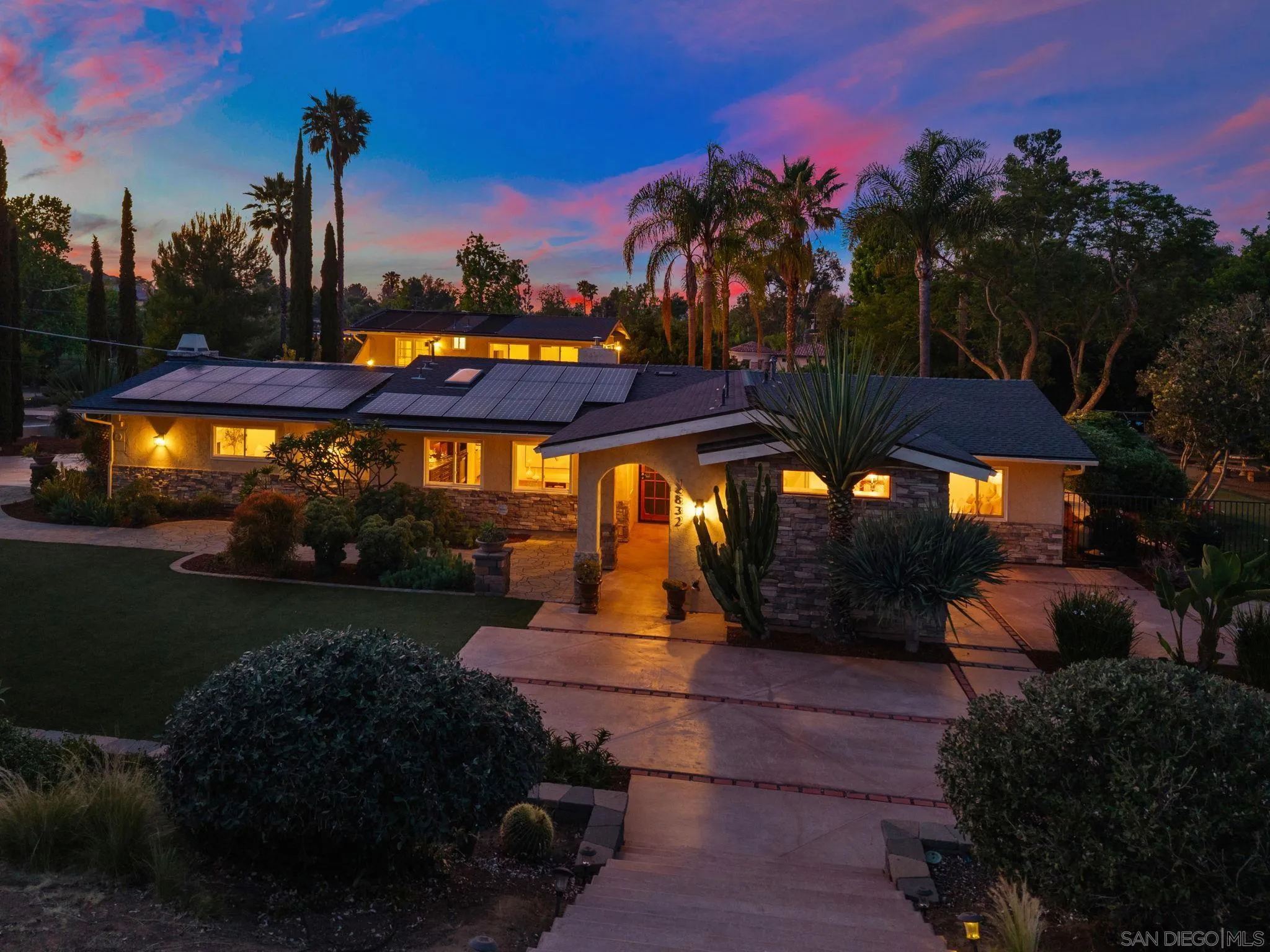 12832 Stone Canyon Road Poway, CA 92064 - Photo 57 of 60 a front view of a house with a yard