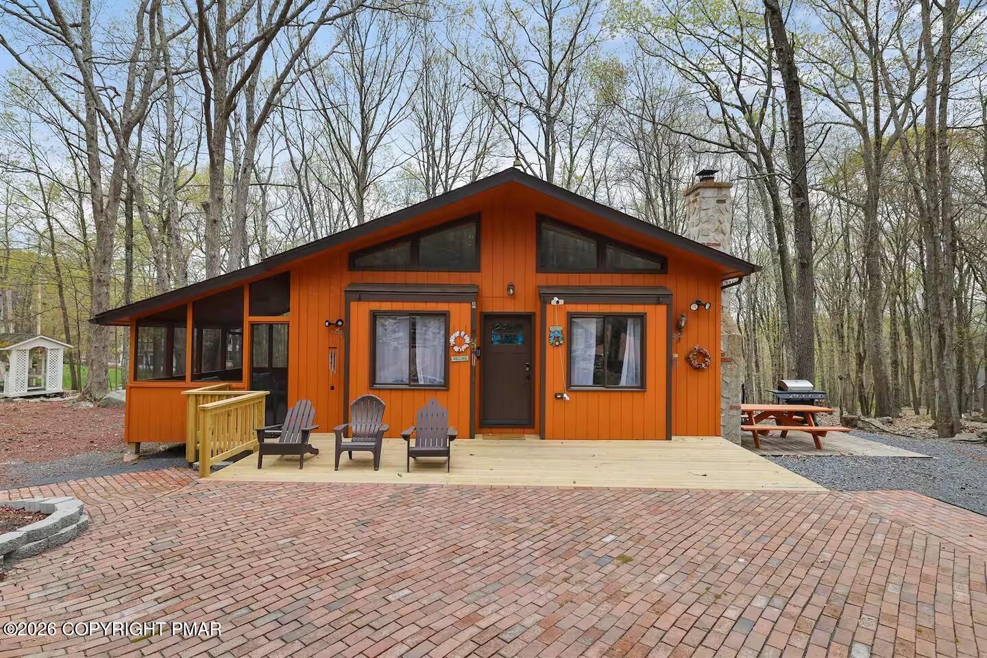 242 St Andrews Drive Bushkill, PA 18324 - Photo 1 of 36 a front view of house with yard outdoor seating