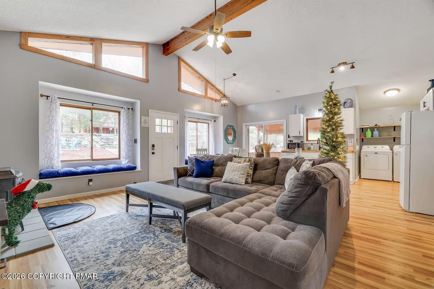 242 St Andrews Drive Bushkill, PA 18324 - Photo 11 of 36 a living room with furniture and wooden floor
