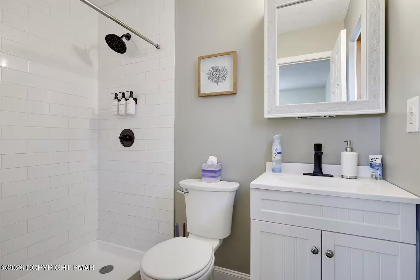 242 St Andrews Drive Bushkill, PA 18324 - Photo 26 of 36 a bathroom with a sink toilet and shower